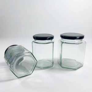 Bocal en verre alimentaire hexagonal avec couvercle métal noir emballage alimentaire maroc (1)