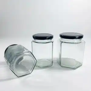 Bocal en verre alimentaire hexagonal avec couvercle métal noir emballage alimentaire maroc (1)