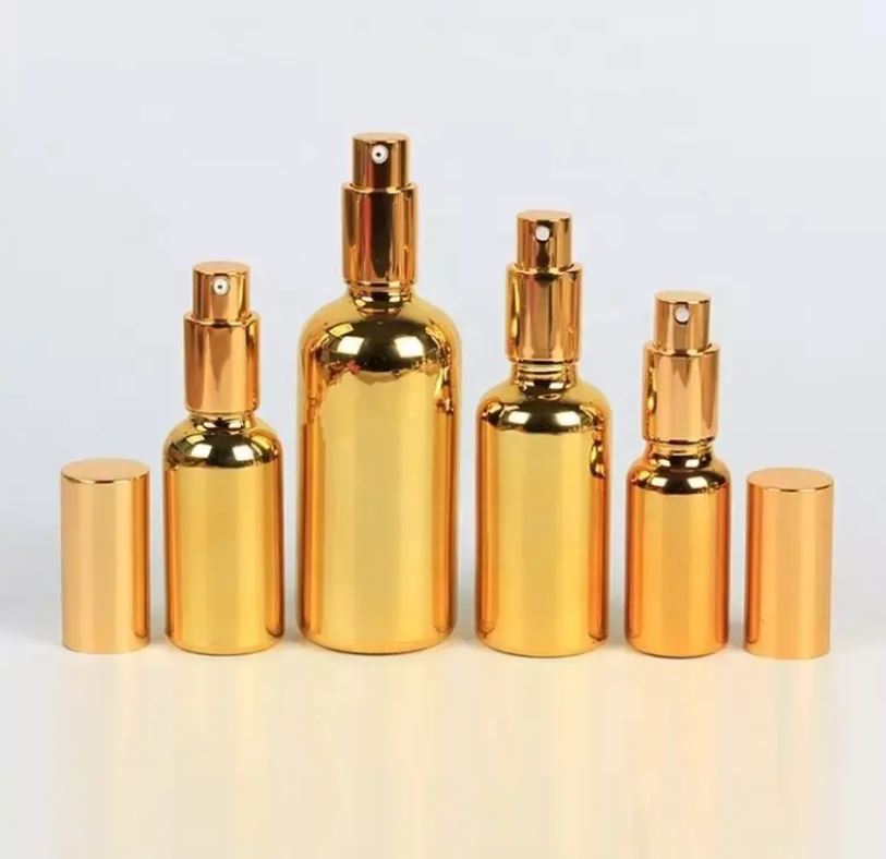 Flacons en verre doré avec vaporisateur pour emballage cosmétique fati pack packaging et emballage maroc