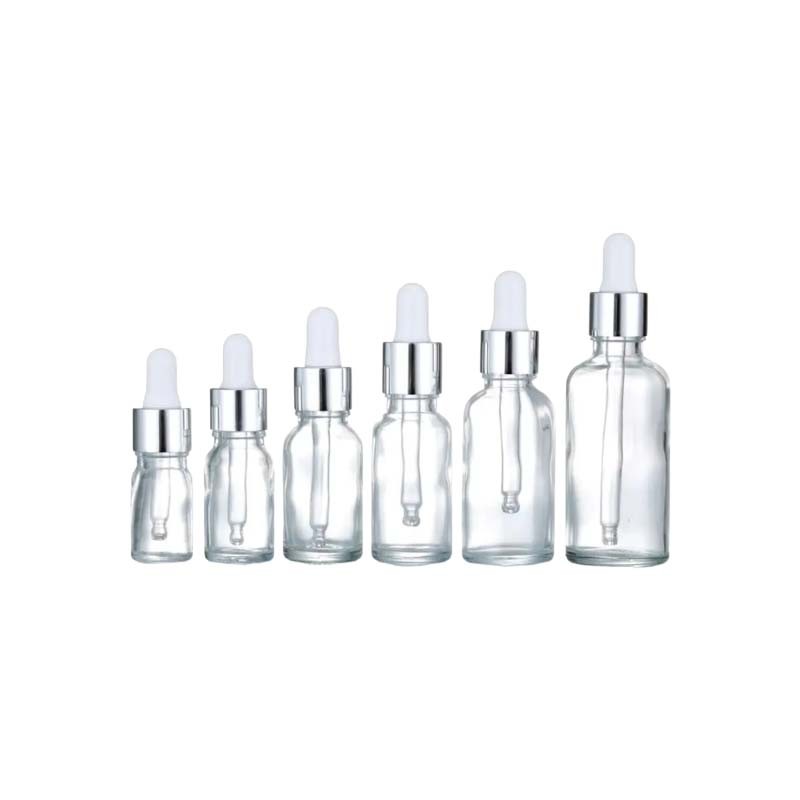 flacons-en-verre-transparent-avec-pipette-blanche-et-cercle-argente-pour-emballage-cosmetique maroc fati pack