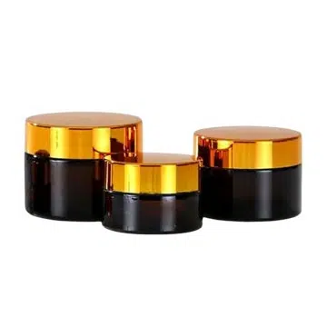 pots-en-verre-noire-avec-couvercle-dore-50g