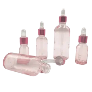 Flacon-compte-goutte-verre-rose-bouchon-rose-2-removebg-preview