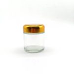 Pot en verre transparent de forme ronde avec couvercle doré 100ml (1)