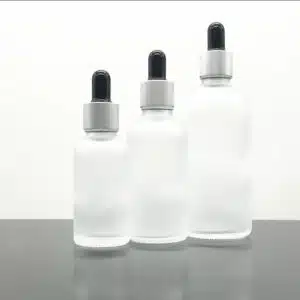 Flacon compte goutte en verre transparent givré bouchon argenté-noir (1)