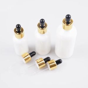 Flacon compte goutte verre blanc bouchon doré-noir (2)