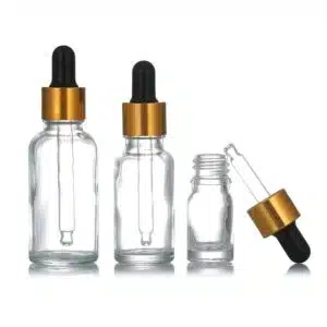 Flacon compte goutte verre transparent bouchon doré-noir (4)