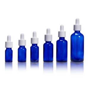 Flacon verre bleu pipette blanche