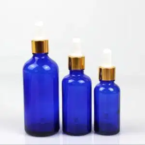 Flacon verre bleu pipprttr doré blanc