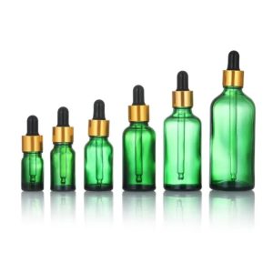 Flacon verre vert doré noir