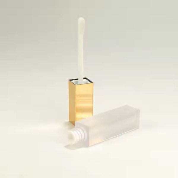 Tube de gloss carré en plastique transparent avec bouchon doré emballage maroc