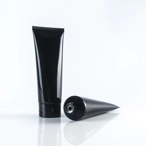 Tube en plastique noir souple avec bouchon à vis – Élégance minimaliste pour soins et cosmétiques emballage cosmetique maroc