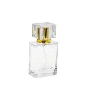 Flacon de parfum carré en verre transparent avec pulvérisateur doré et capuchon acrylique emballage maroc parfum
